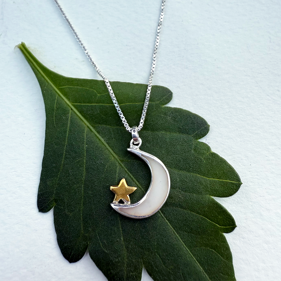 Sterling silver mother-of-pearl moon and star necklace, handmade by women silversmiths